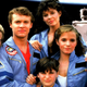 The cast of Space Camp is pretty crazy: Yes, that’s Kelly Preston, Tate Donovan, and Lea Thompson along with Joaquin Phoenix, Kate Capshaw, and Larry B. Scott.